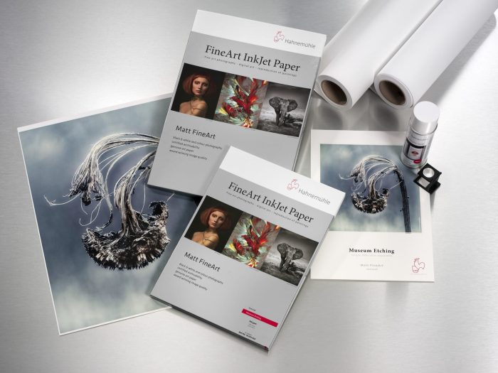 several papers and a tube of paper