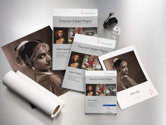 a group of papers and a roll of paper
