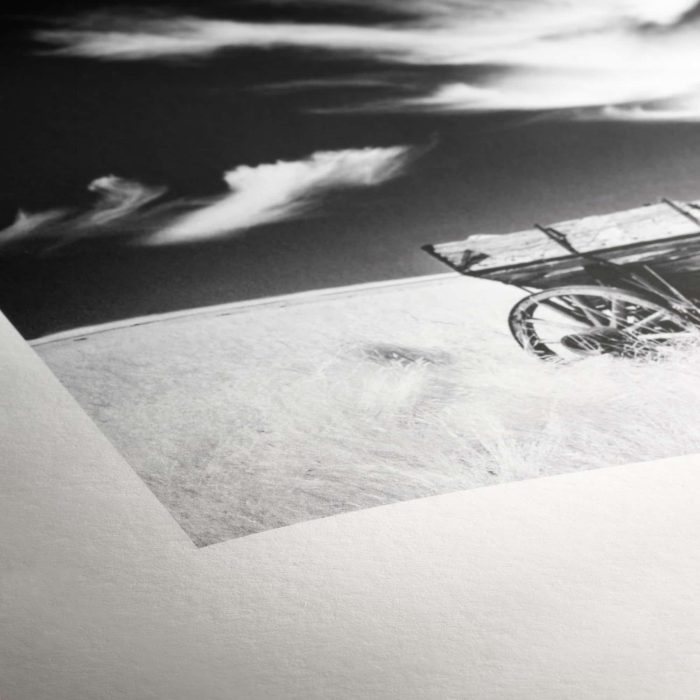 a black and white photo of a cart